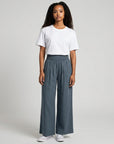 Blue-gray smocked high-waist wide-leg pants with gathered elastic waistband