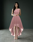Pink sleeveless high-low cocktail dress with lace bodice and flowing chiffon skirt