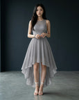Grey sleeveless high-low cocktail dress with lace bodice and asymmetrical chiffon hem