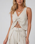 Cropped linen-blend tank top with V-neck ruched tie front, sleeveless, light cream