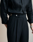 High-waisted tailored trousers in beige, pleated front and buttoned waistband