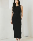 Black sleeveless ribbed knit midi dress, crew neck, straight hem.