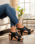 Black distressed leather open-toe wedge sandals with platform wedge heel