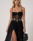 Black sheer chiffon maxi dress with corset-style bust cups, circular waist belt, thigh slit