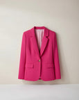Pink button blazer with notch lapels, gold button, and flap pockets