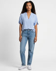 Light blue lightweight chiffon blouse with V-neck and short flutter sleeves