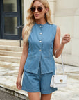Light blue denim vest and shorts set with button front and side pockets