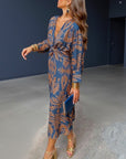 Blue patterned maxi A-line dress with V-neck, tie waist, long sleeves