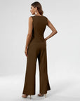 Women’s brown sleeveless co ord set with structured waistcoat and wide-leg trousers, side view