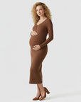 Women's brown ribbed knit maternity midi dress, V-neck and long sleeves, front 3/4 view.