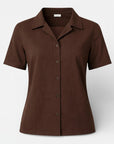 Dark brown short-sleeve button-up shirt close-up with collar and button placket