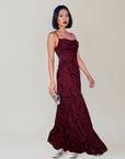 Burgundy jacquard maxi dress with thin straps and textured floral jacquard skirt