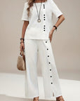 Women's white set: short-sleeve button-front top and wide-leg trousers with front buttons