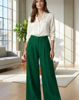 Deep green linen-blend wide-leg trousers, high-waist with pleated front and wide legs