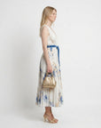 Side view sleeveless V-neck pleated midi dress, cream with blue abstract print
