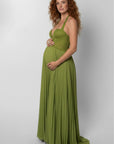 Olive green maternity maxi dress, three-quarter view, sweetheart bodice and pleated maxi skirt