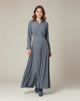 Slate blue midi shirt dress with three-quarter sleeves, button front, and belt
