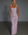 Embellished evening gown with square neckline, sleeveless straps, and long column fit in pale lavender.