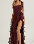 Burgundy maxi dress with ruffled layers and side slit, spaghetti straps