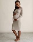 Cream ribbed maternity midi dress with long sleeves and wrap-front crossover bodice