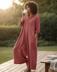 Women’s pink oversized cotton-linen jumpsuit with button front and three-quarter sleeves