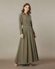 Olive green midi shirt dress with long sleeves, button front, and waist tie