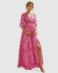 Floral chiffon maternity maxi dress in pink with white vine print, V-neck, side slit