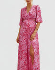 Floral chiffon maternity maxi dress, pink-and-white print, V-neck wrap with ruching, side slit