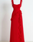 Red maxi dress with tiered ruffle detailing on straps and skirt