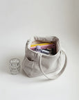 Corduroy tote bag in off-white with ribbed texture and open top