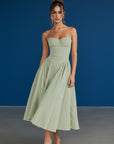 Sage green fitted midi dress with adjustable spaghetti straps and gathered full skirt