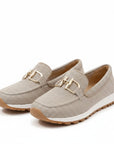 Beige mesh slip-on loafers with gold bit hardware and tan grippy outsole.
