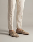 Beige suede loafers with horsebit detail and almond toe, slip-on style