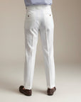 Men's high-waisted straight-leg tailored trousers in white, front view with belt loops