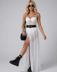 White sheer chiffon maxi dress with corset-style bodice, gold buckle waist belt, side slit