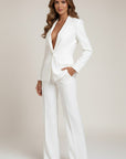 White tailored suit with V-neck blazer and wide-leg trousers, long sleeves