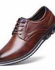 Brown leather derby dress shoes with round toe, lace-up front and blue eyelet accents