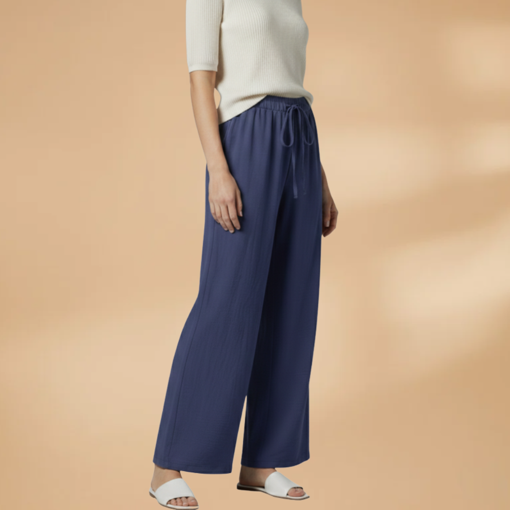 Women’s navy blue wide-leg linen trousers, side view, elastic drawstring waist