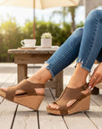 Brown distressed leather open-toe wedge sandals with ankle strap