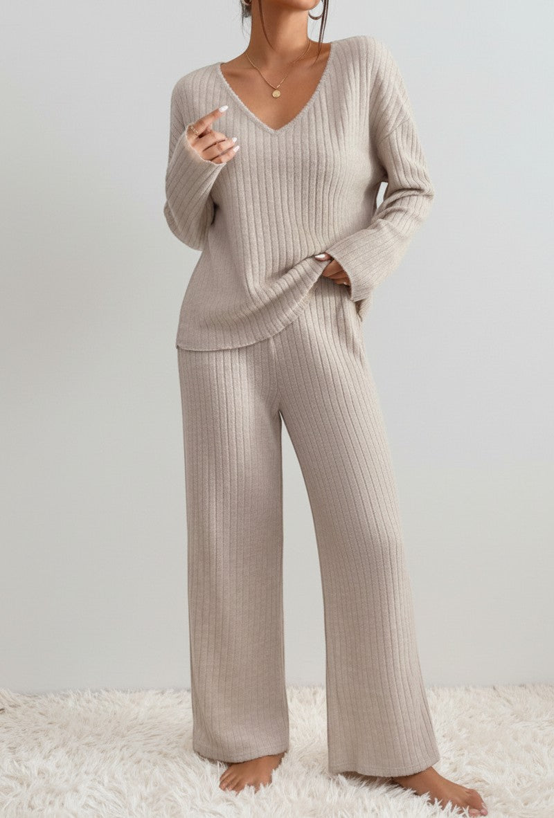 BENJAMIN LONDON beige ribbed knit V-neck loungewear set with wide leg pants.