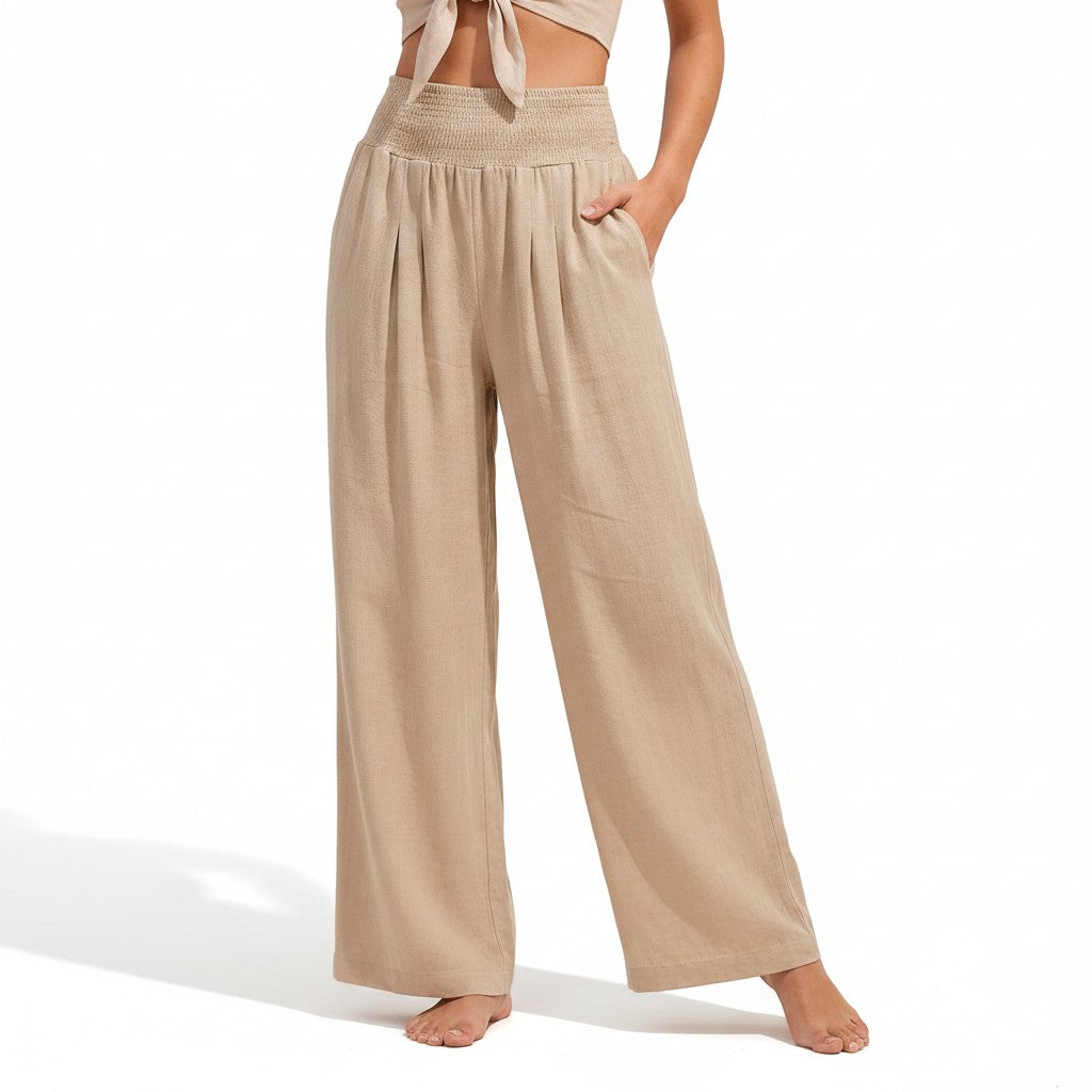 Beige smocked high-waist wide-leg pants with gathered elastic waistband