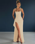 Beige evening maxi dress with square neckline and thigh-high side slit