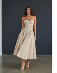 Beige fitted midi dress with adjustable spaghetti straps and gathered full skirt