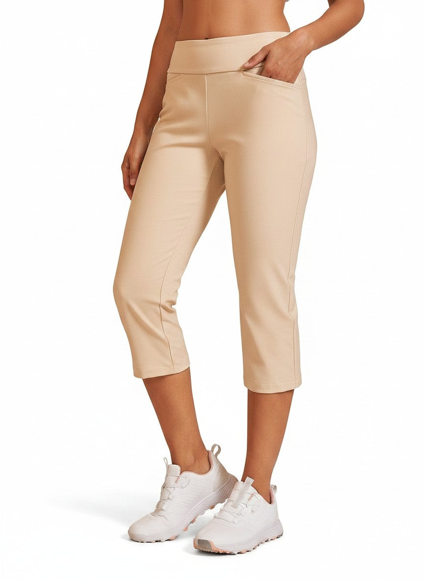 Beige capri pants with mid-rise pull-on waist, cropped tapered legs and stretch fit