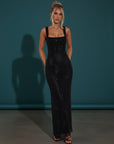 Embellished evening gown with square neckline, sleeveless straps, and long column fit in black.
