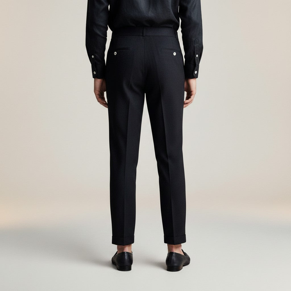 High-waisted tailored trousers in black, double-button waistband and tapered legs