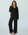 Black ribbed knit V-neck top and wide-leg trousers loungewear set