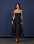 Black fitted midi dress with adjustable spaghetti straps and gathered A-line skirt