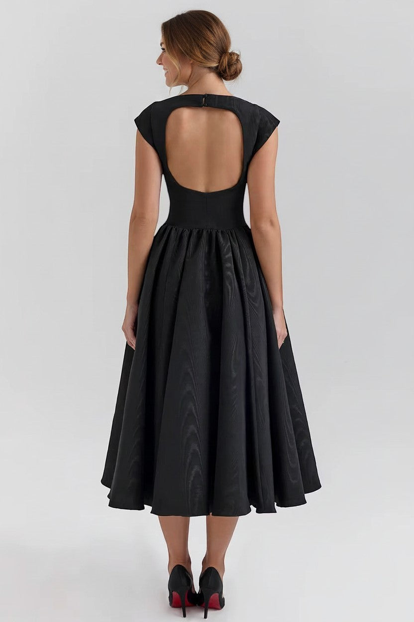 Back view black cap-sleeve midi dress with open back and gathered skirt