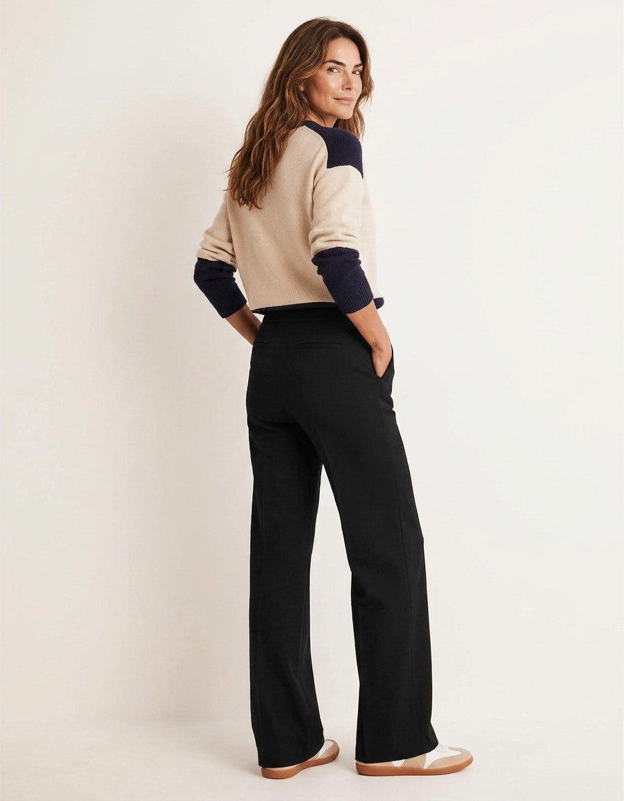 Women’s high-waisted wide-leg trousers, dark black, side view